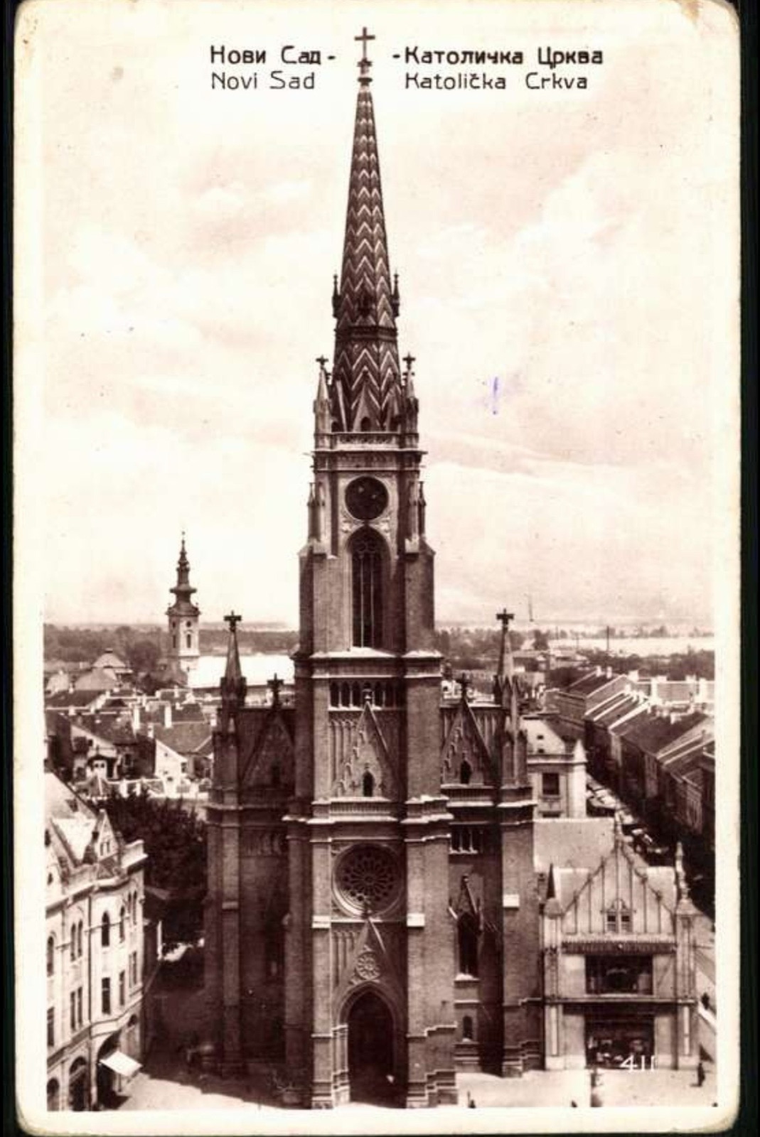 The Catholic church tower rising above Novi Sad's rooftops, Name of Mary Church, 1919–1941