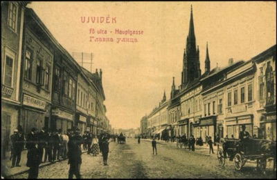 Crowds Along Main Street's Shopfronts, Toward the Church, 1907, Zmaj Jovina Street, Novi Sad