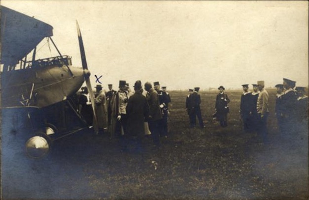 Archduke Joseph talks with an aviator beside a biplane, Novi Sad Airfield, 12 May 1913