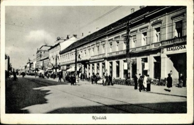 A Shopping Street With a Hotel Sign and Passersby, 1941, Hotel Queen Mary, Novi Sad