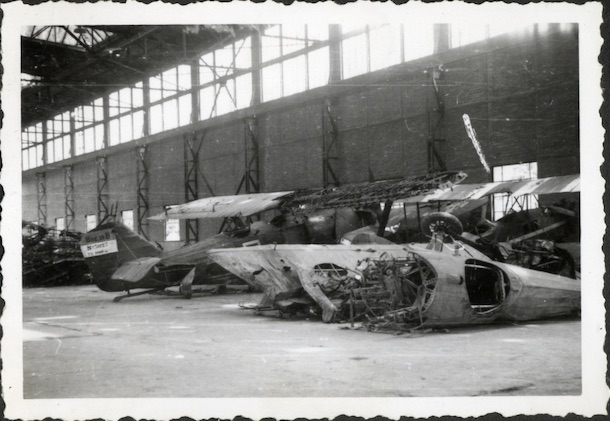 Wrecked biplanes inside a bombed hangar at the Novi Sad airfield, 1941