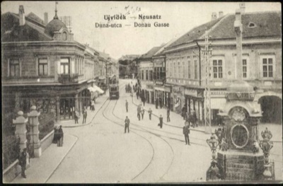 Duna Street, with the tram passing an ornate fountain, Dunavska Street, Novi Sad, 1896–1918