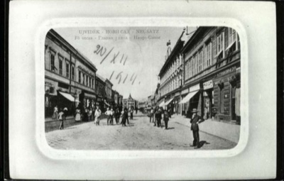 Main Street, a Bowler-hatted Man Watches Children Play, 1914, Zmaj Jovina Street, Novi Sad