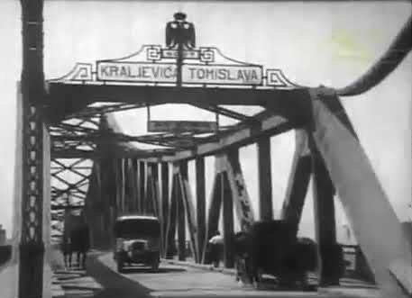 A Film Still of Cars and a Cart Crossing the Prince Tomislav Bridge, Novi Sad, 1930–1941