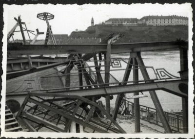 Wreckage of the bridge, with Petrovaradin Fortress beyond, Prince Tomislav Bridge, Novi Sad, 1941