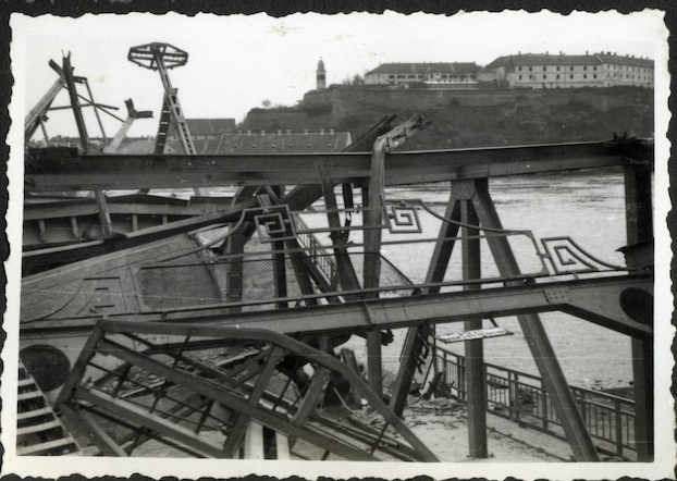 Wreckage of the bridge, with Petrovaradin Fortress beyond, Prince Tomislav Bridge, Novi Sad, 1941