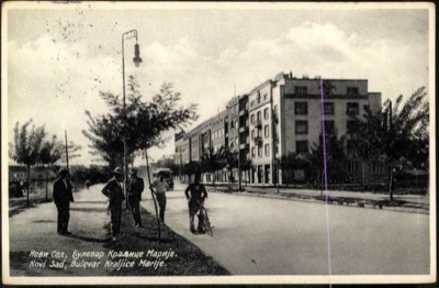 Queen Mary Boulevard, Men Gathered as a Tram Approaches, Novi Sad, by October 1933
