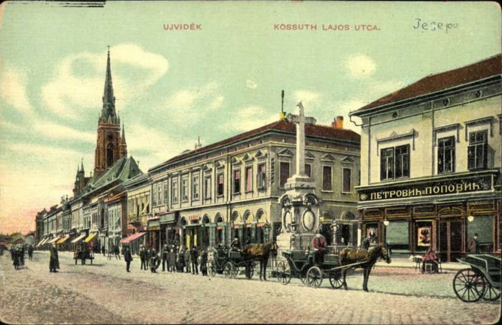 Kossuth Lajos Street, the church spire and a stone monument, Zmaj Jovina Street, Novi Sad, by June 1911