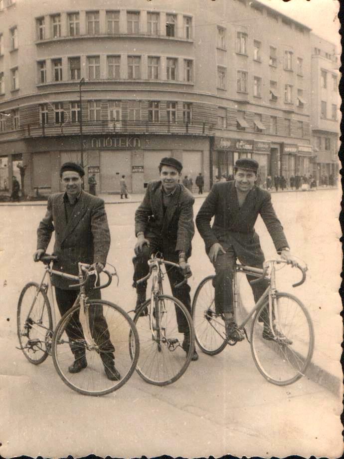 Three cyclists outside the pharmacy, Queen Mary Boulevard, Novi Sad, around 1950