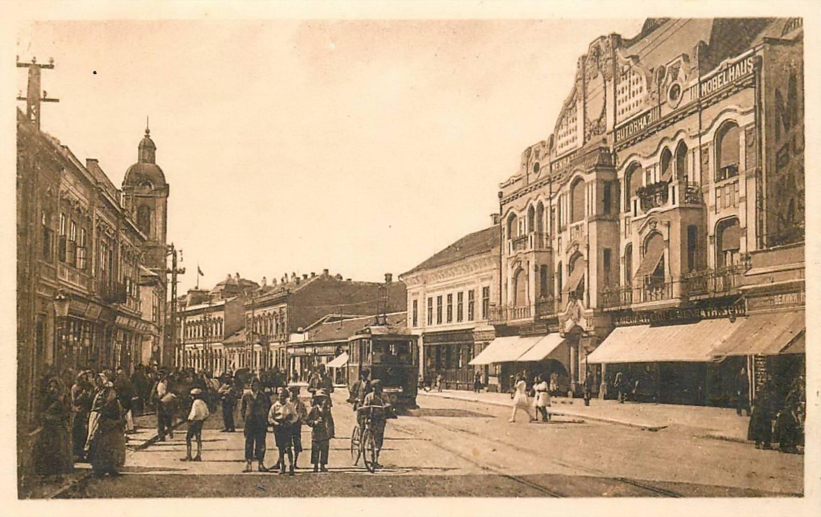 A tram before the furniture house, Menrath Palace, Novi Sad, 1911–1929