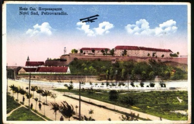 Petrovaradin Fortress, a Biplane Banking Overhead, 1931