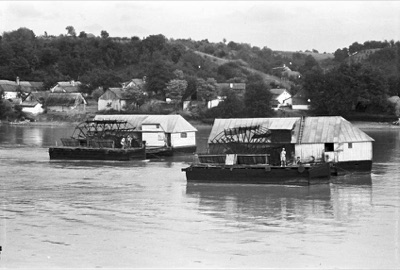 Two ship mills and their millers below a Danube village at Novi Sad, about 1937 to 1950