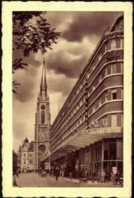 Gothic Spire and the Hotel Rex Awning Over a Crowded Pavement, 1943, The Tanurdžić Palace, Novi Sad