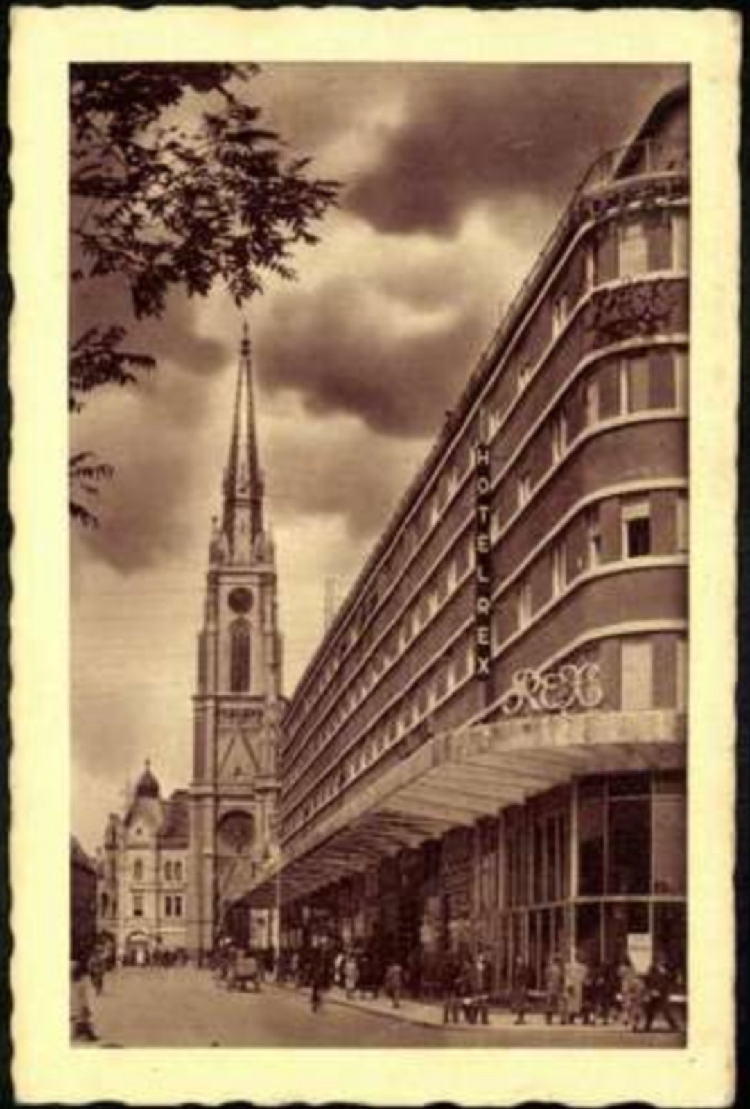 Gothic Spire and the Hotel Rex Awning Over a Crowded Pavement, 1943, The Tanurdžić Palace, Novi Sad