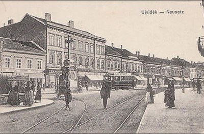 An Electric Tram Passes the Epiphany Cross on Novi Sad's Main Street, Zmaj Jovina Street, 1910